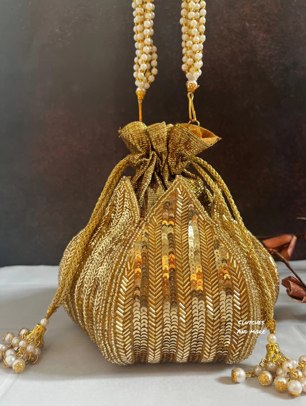 Golden clutches online discount