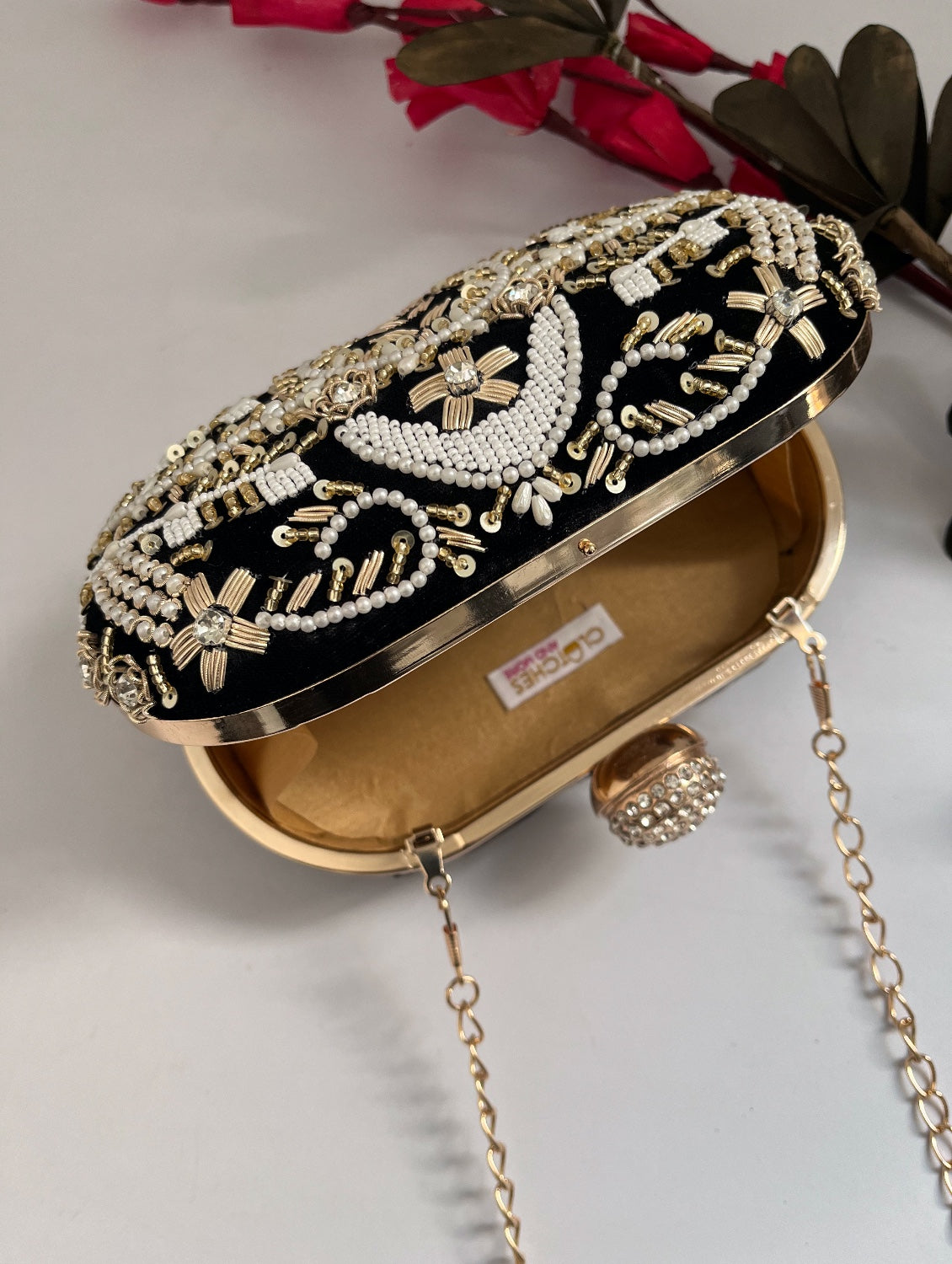 Aarohi Black Capsule clutch