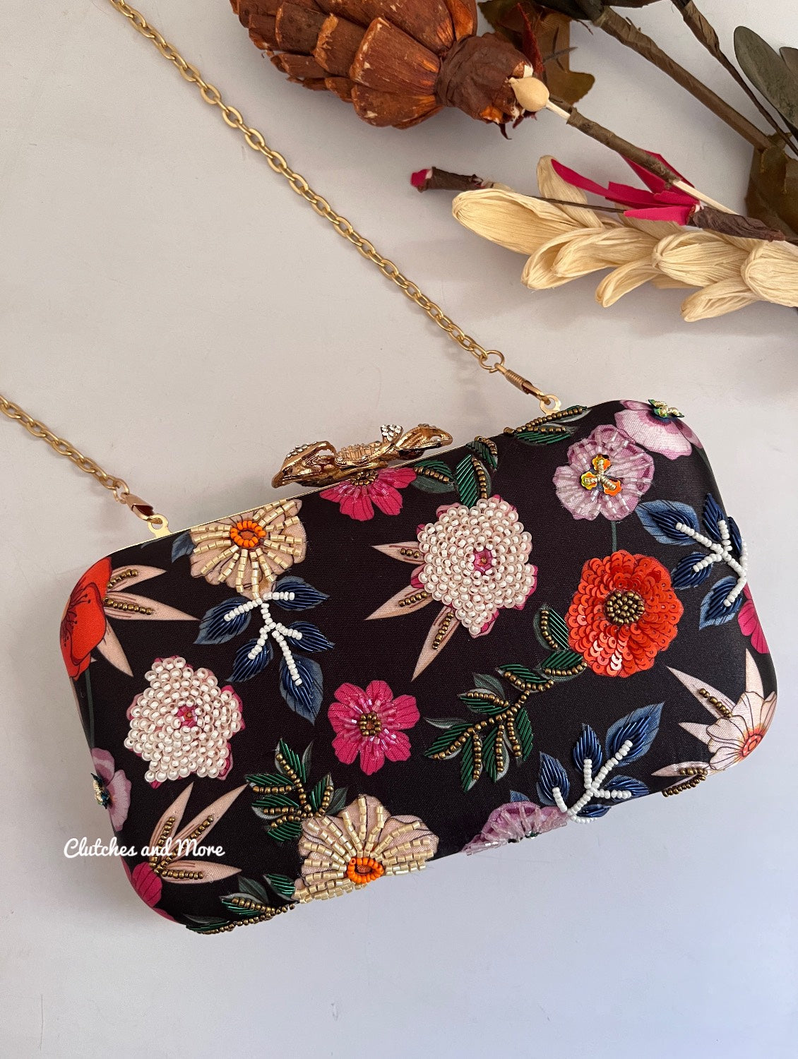 Poppy Multicoloured Black Clutch