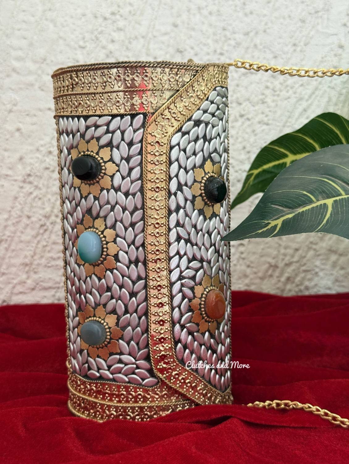 Sejal Cylindrical Boho Brass clutch