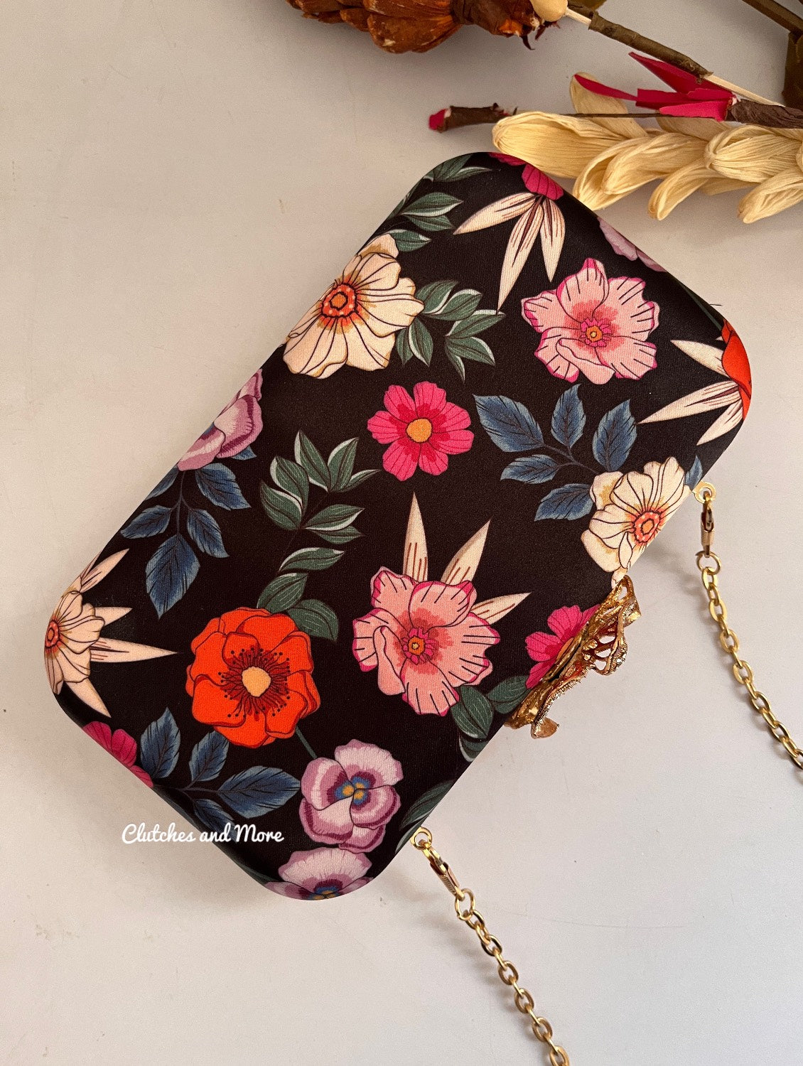 Poppy Multicoloured Black Clutch