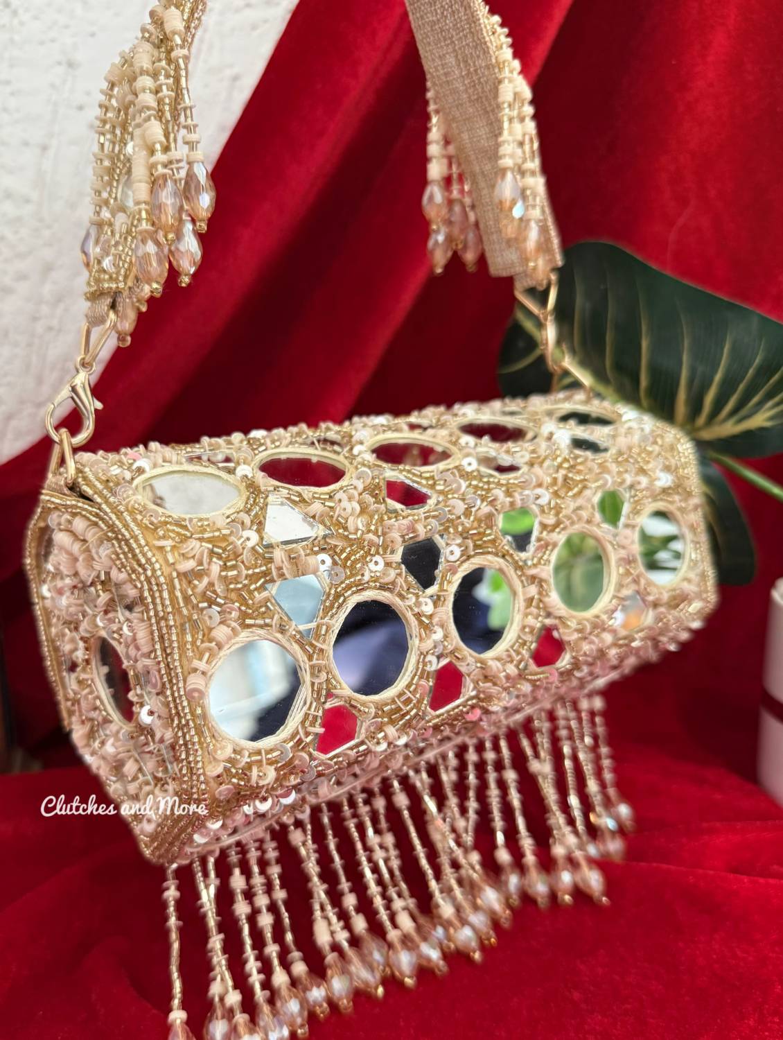 Cylindrical Mirror Bag with Tassles Gold