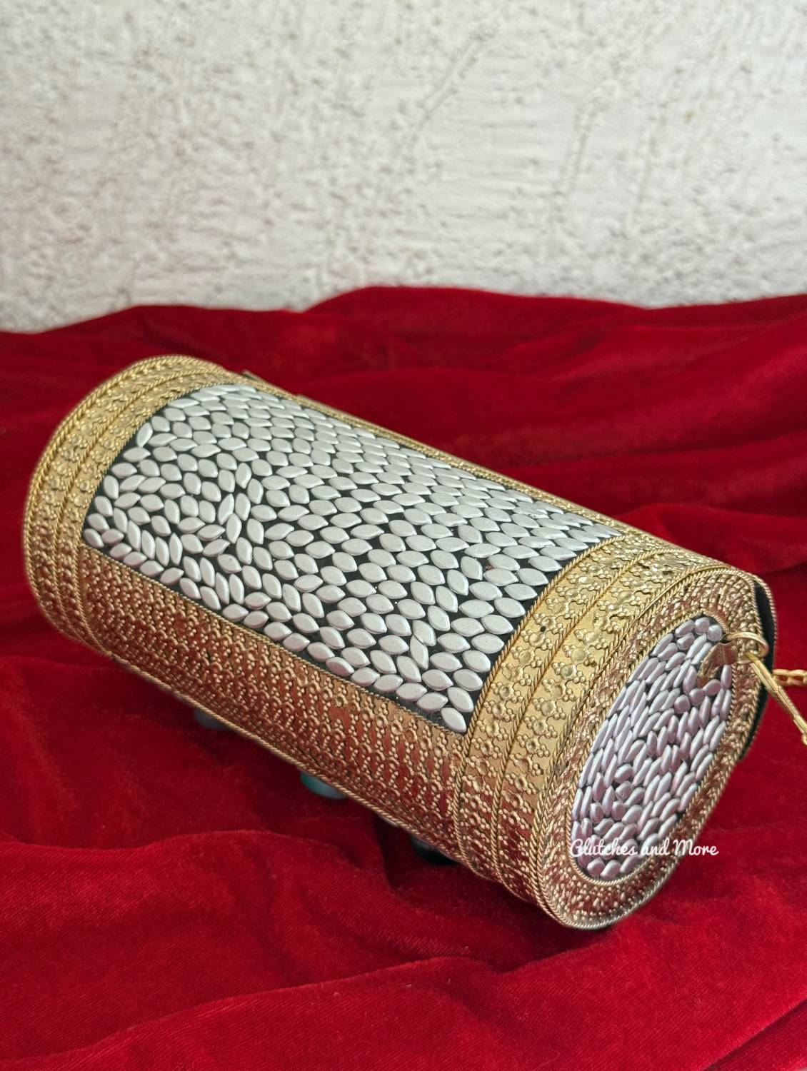 Sejal Cylindrical Boho Brass clutch