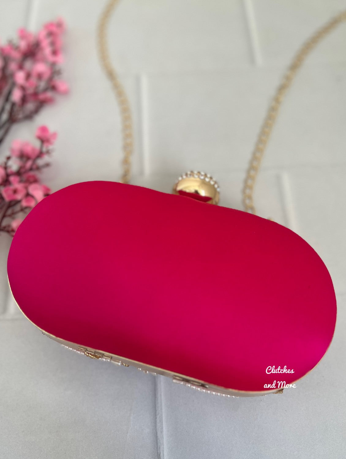 Aarohi Pink Capsule clutch