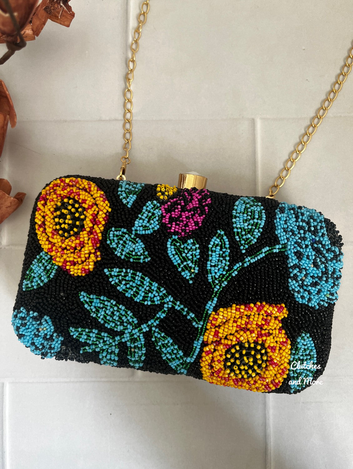 Black floral beaded clutch