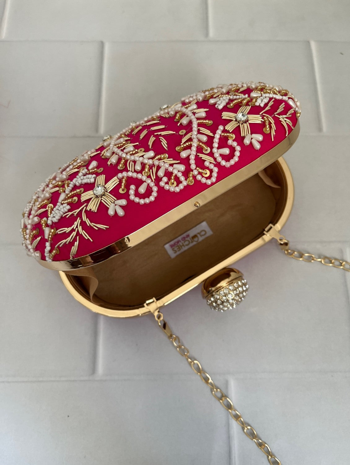 Aarohi Pink Capsule clutch