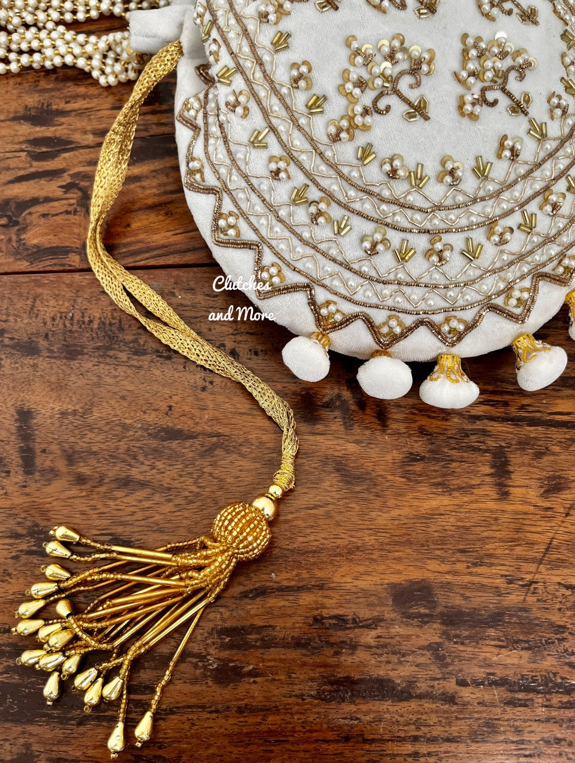 White Ball Tassles Potli
