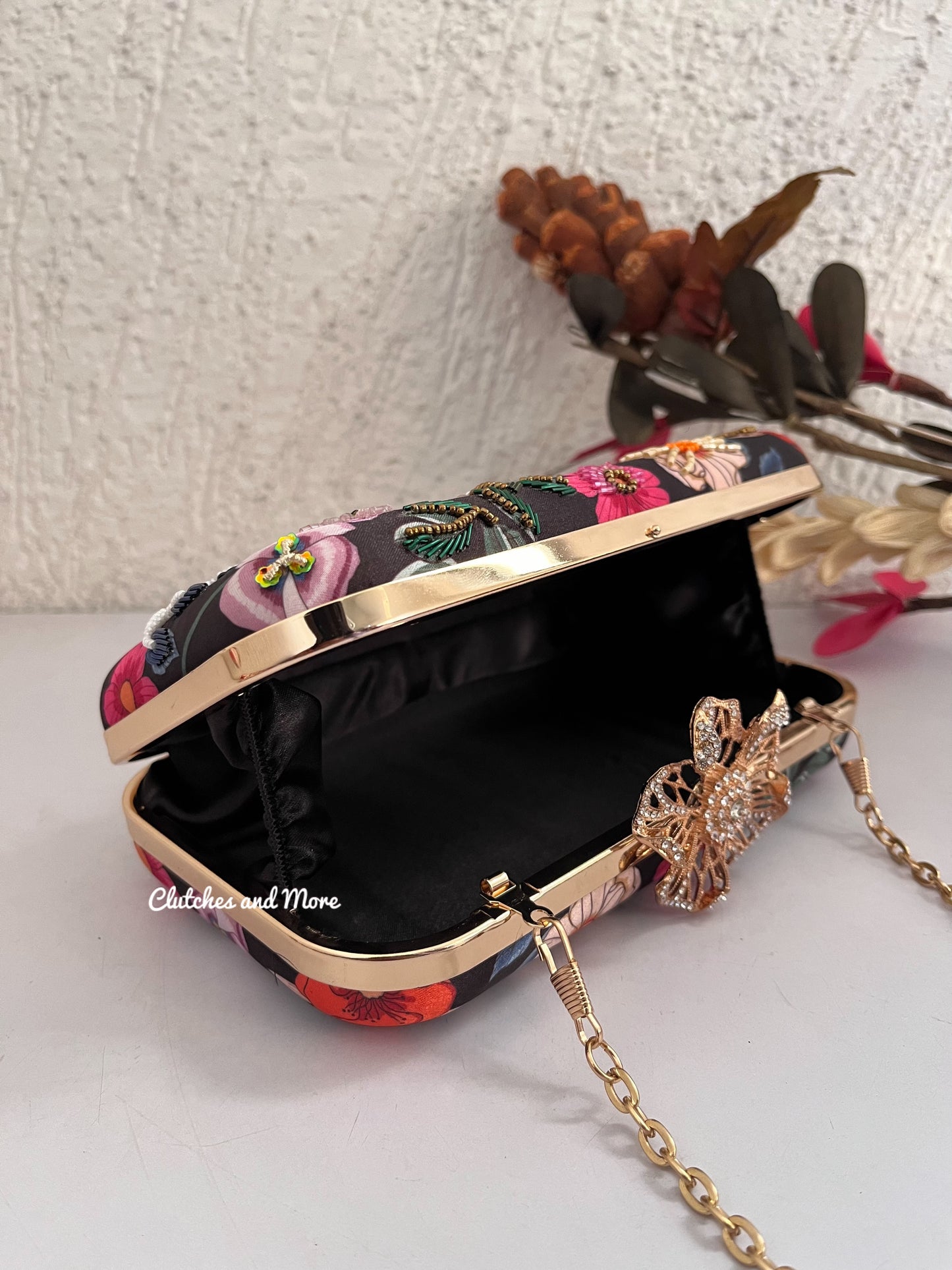 Poppy Multicoloured Black Clutch