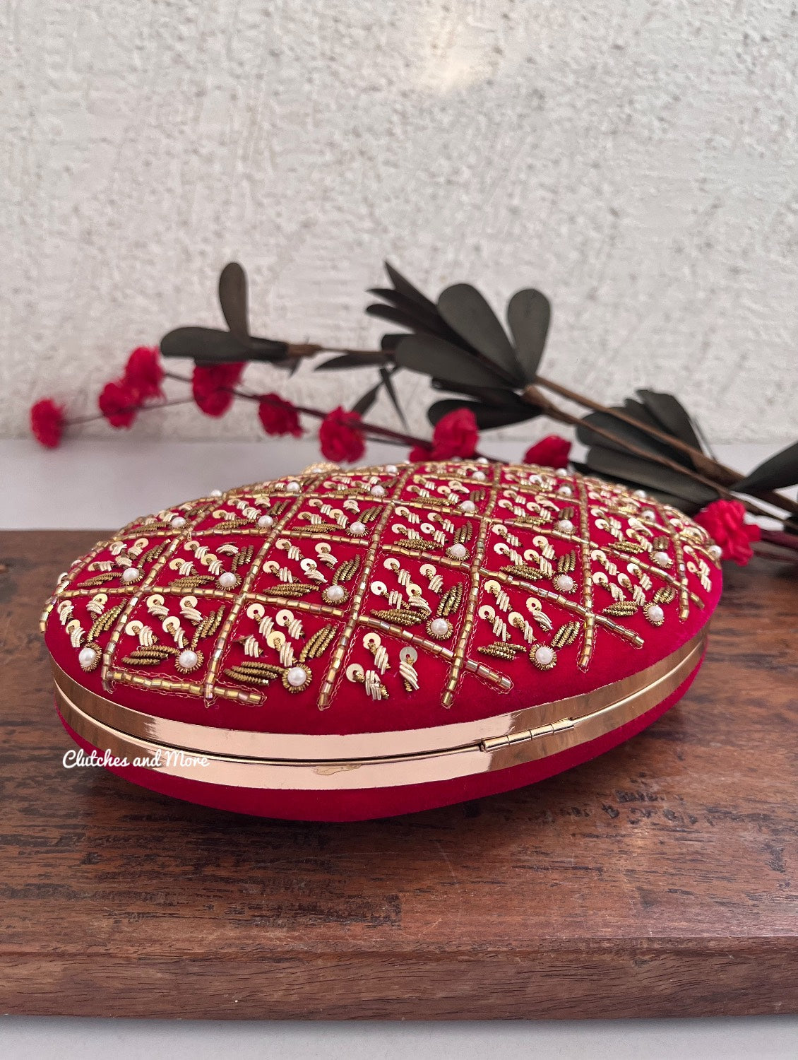 Ananya Big Capsule Clutch Pink