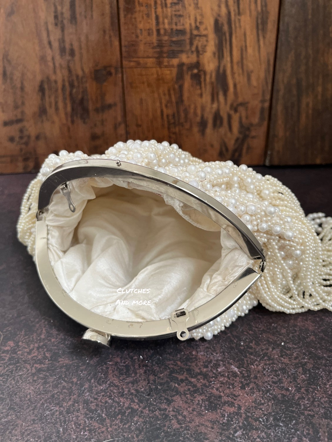 White pearl batua bag