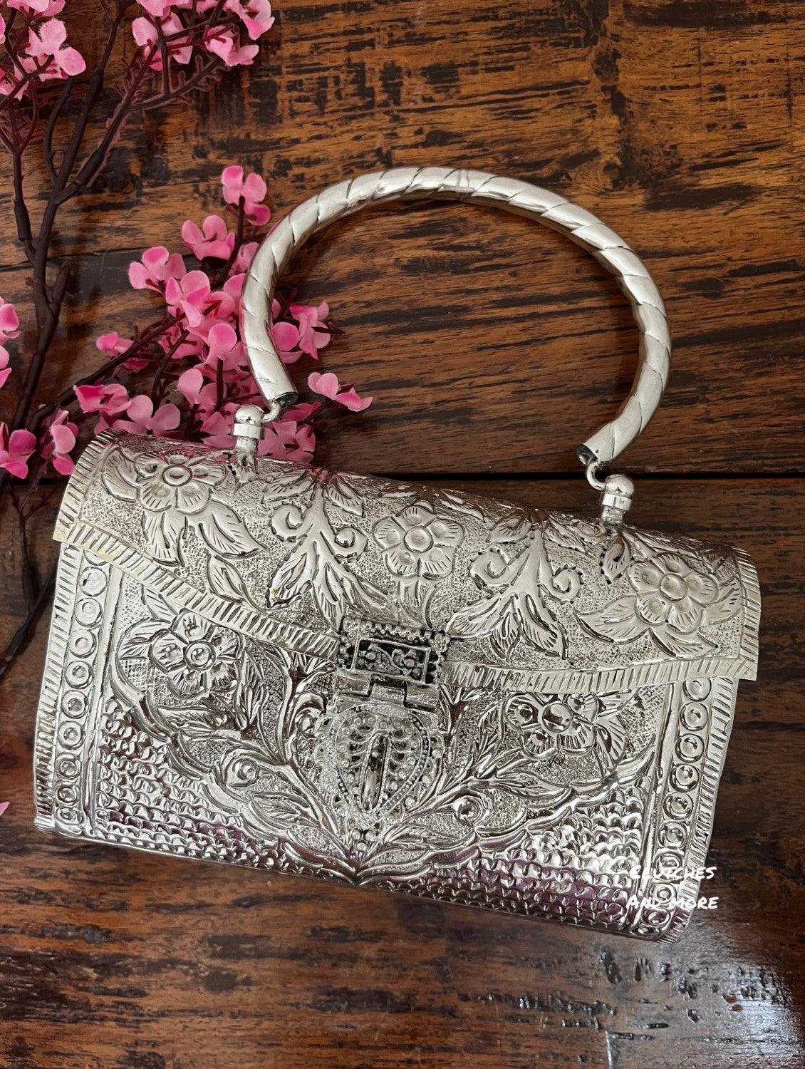 German cheap silver clutch