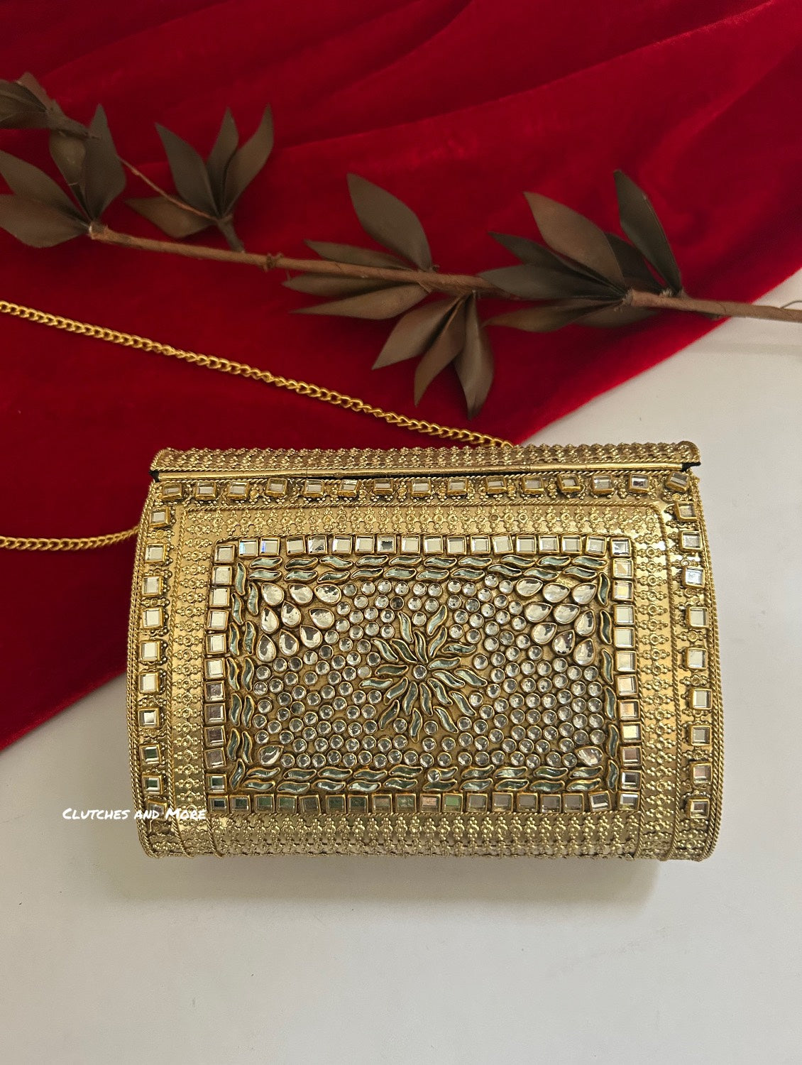 Kasika Kundan Brass Clutch Multicolored