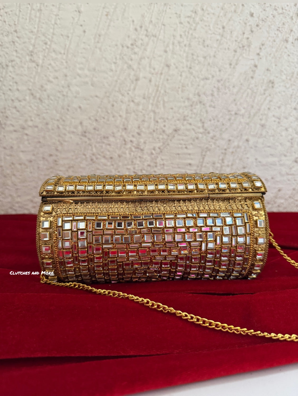 Kasika Kundan Brass Clutch Cylindrical Gold