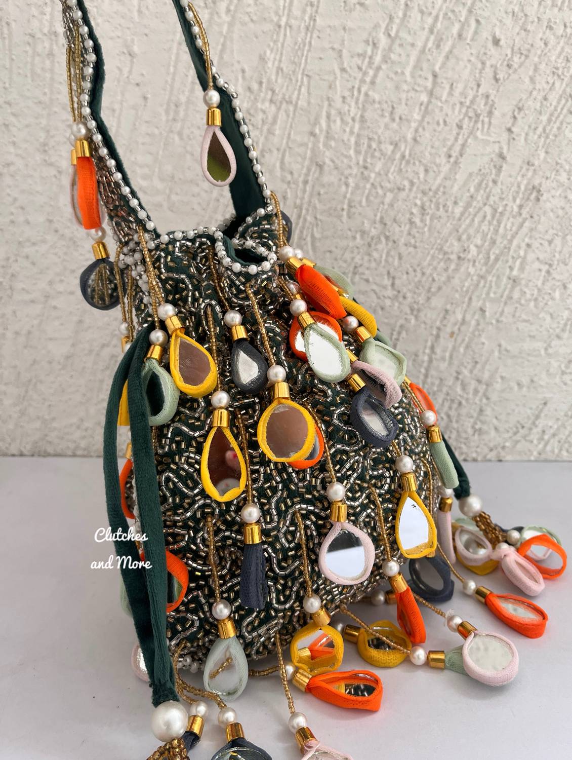 Manya Mirror Tassel Potli Multicoloured (green base)