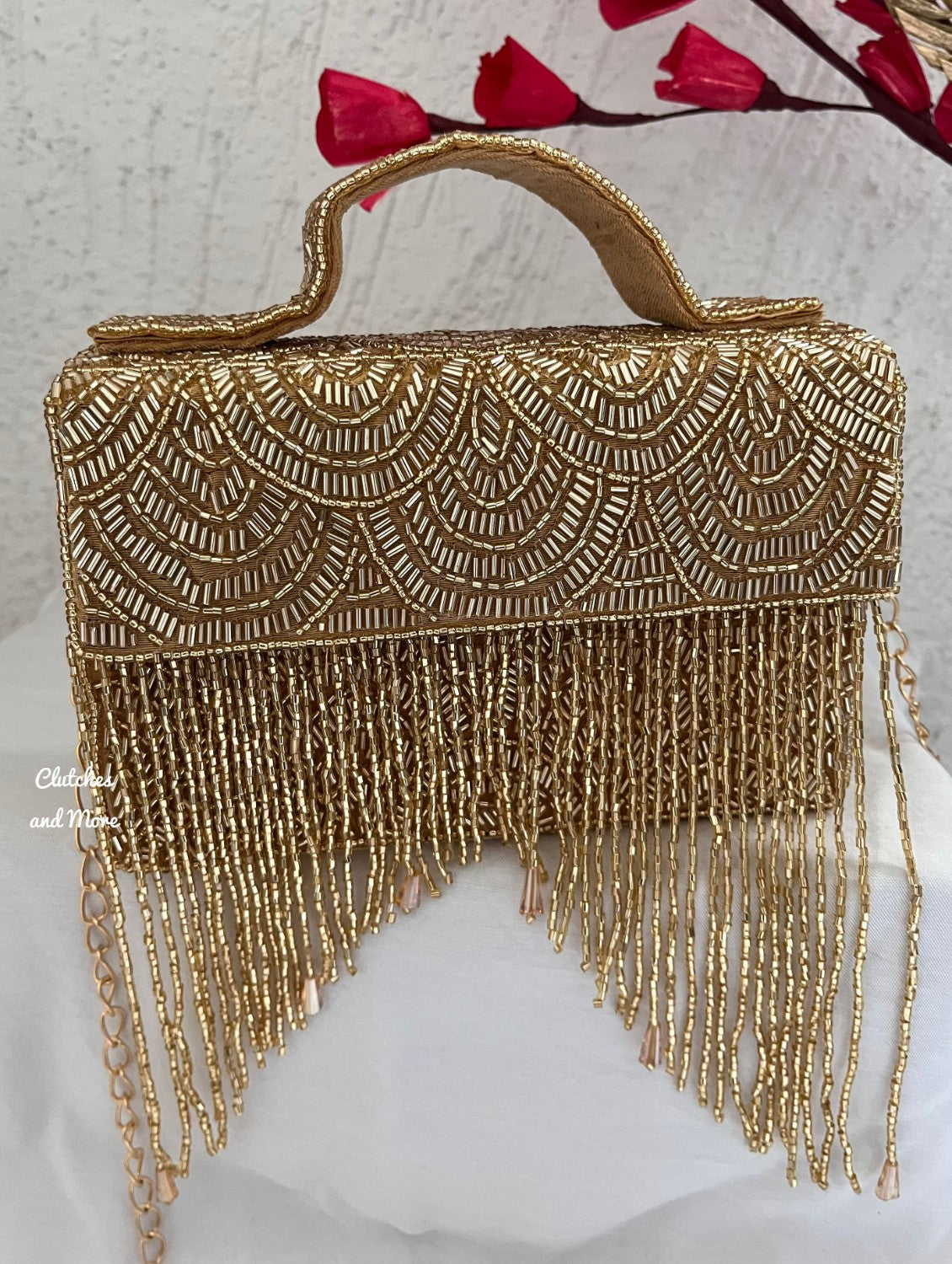 Gold colour clutch on sale bag