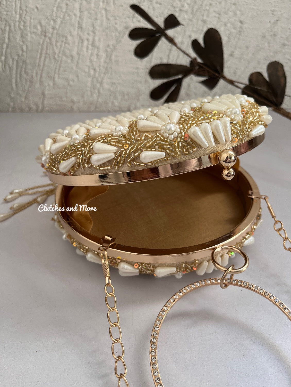 Praneeta Pearl Droplets Clutch Gold