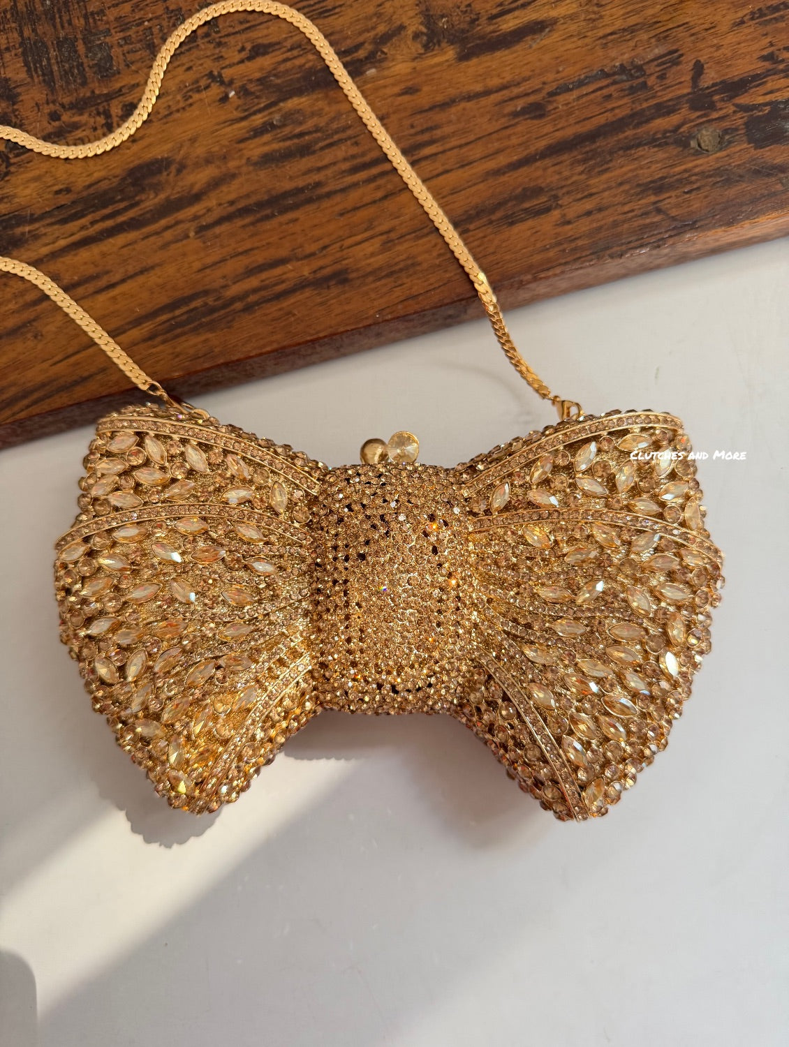 Regal Crystal Bow Clutch