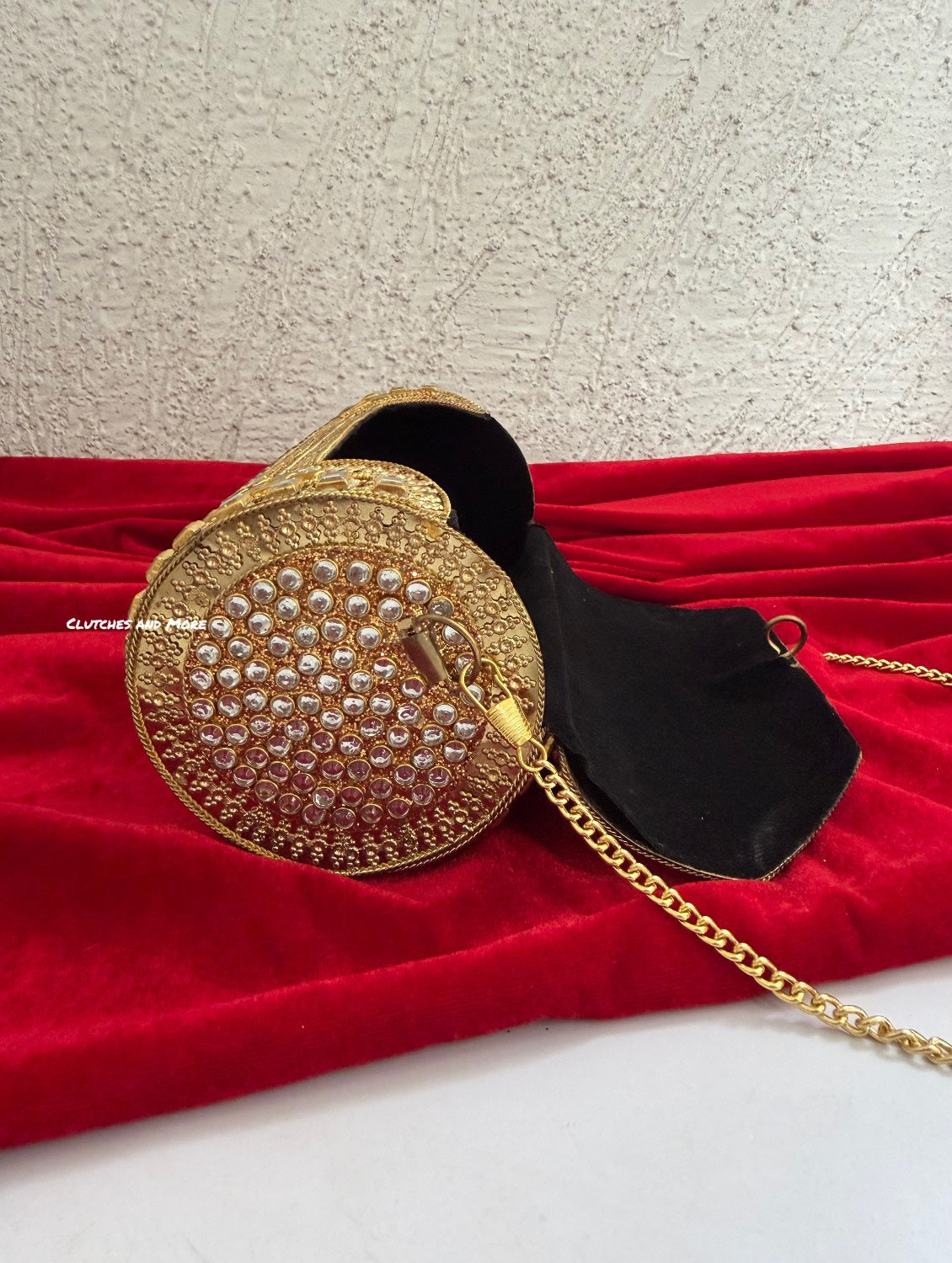 Kasika Kundan Brass Clutch Cylindrical Gold
