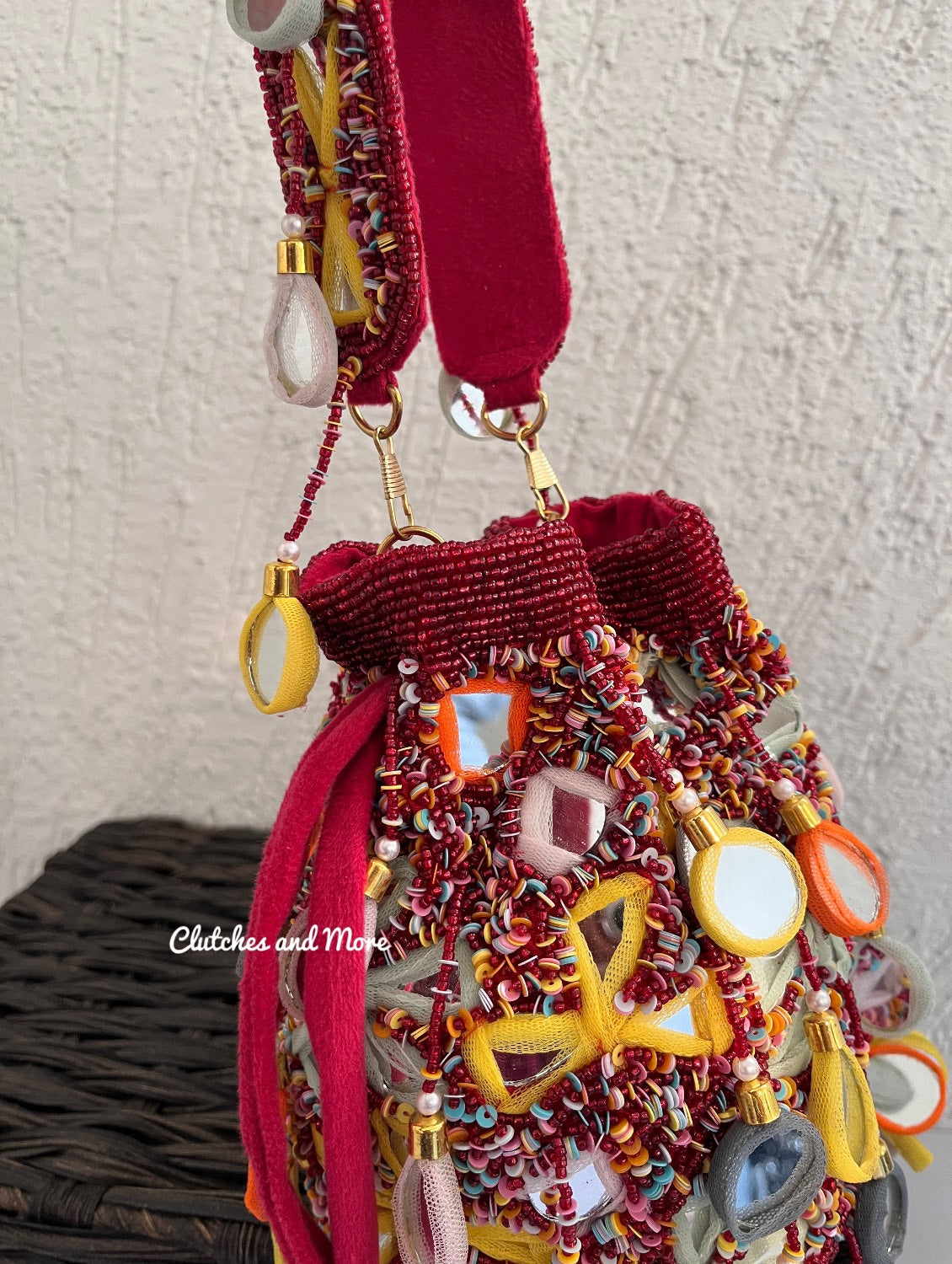 Mirror Tassel Potli Multicoloured ( Red base)