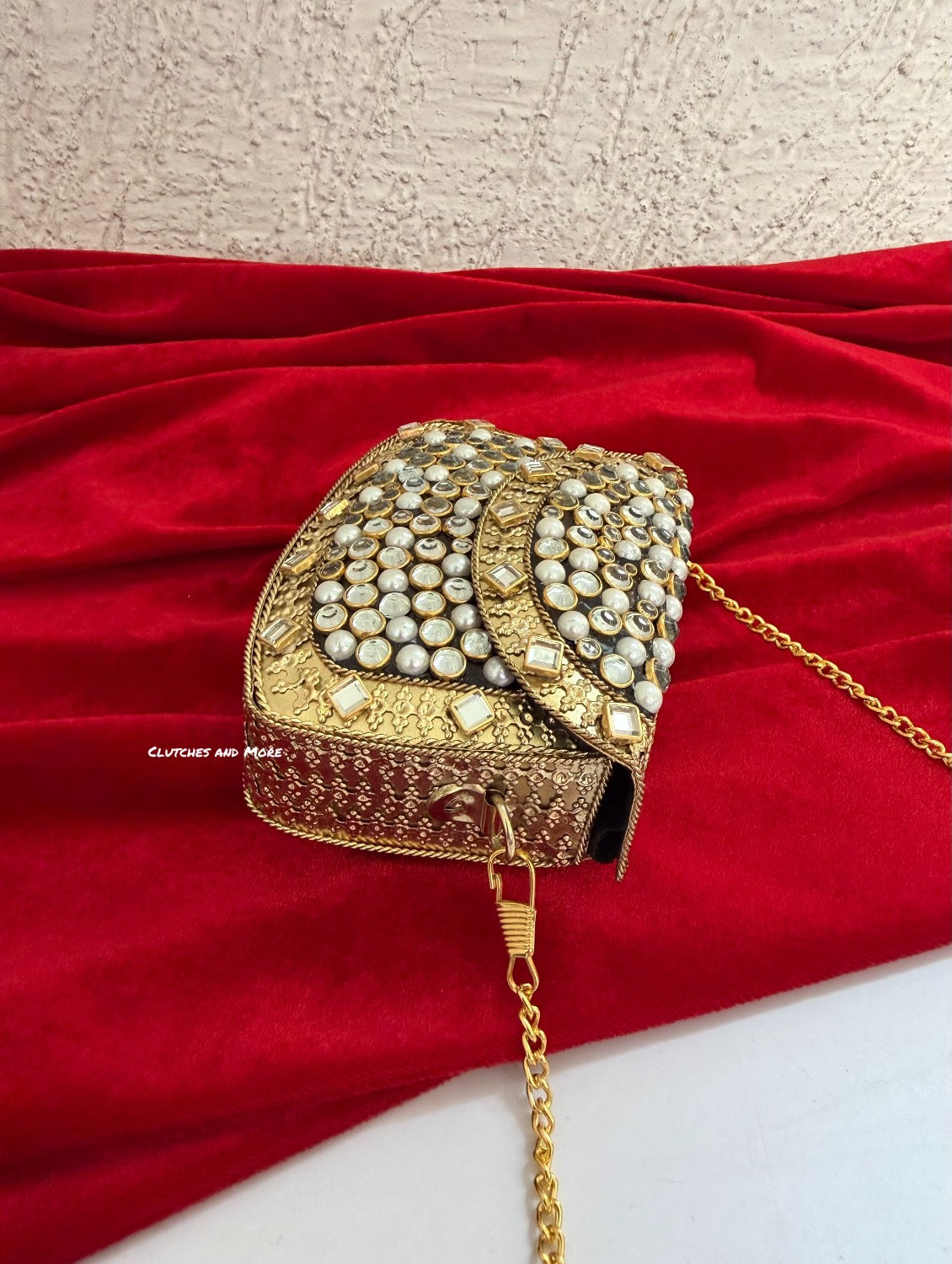 Kasika Kundan Brass Clutch Mini Gold White
