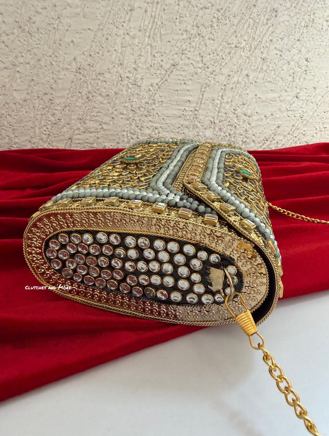 Kasika Kundan Brass Clutch Multicolored