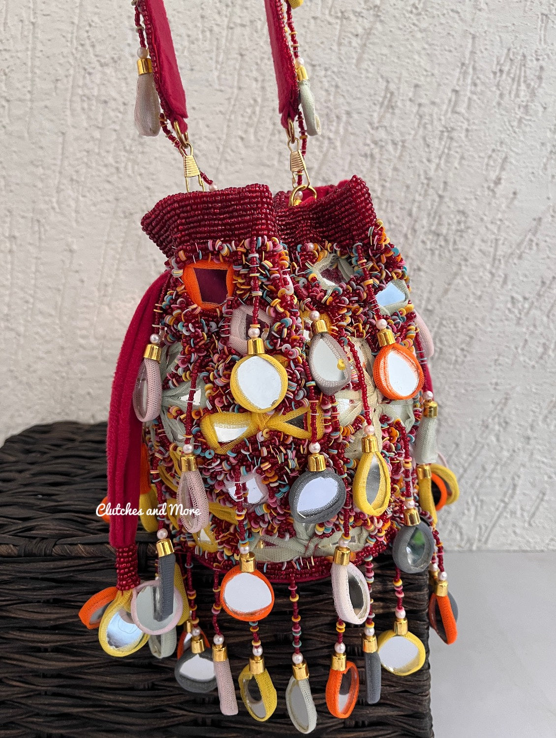 Mirror Tassel Potli Multicoloured ( Red base)
