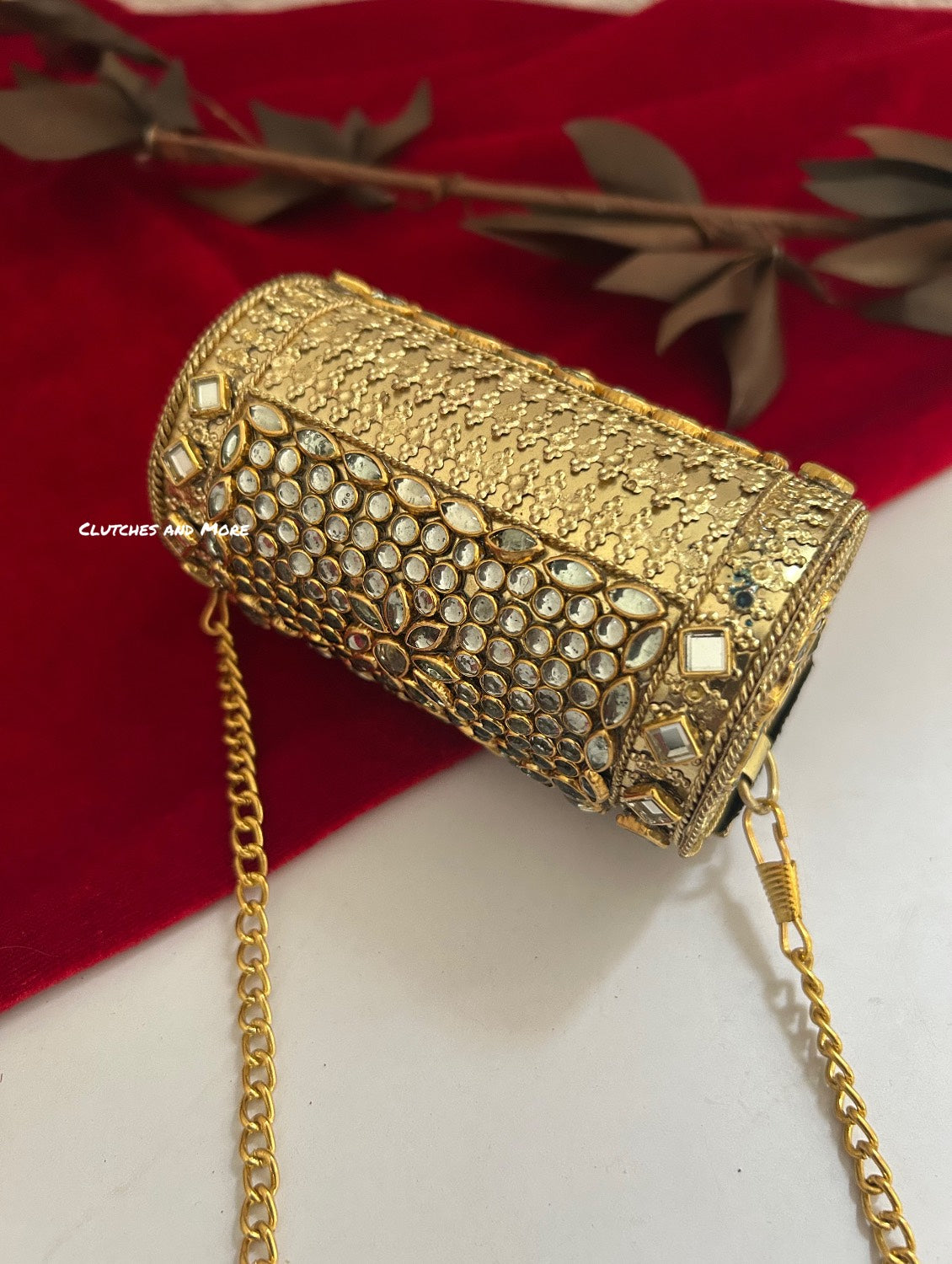 Kasika Kundan Brass Mini Clutch Cylindrical
