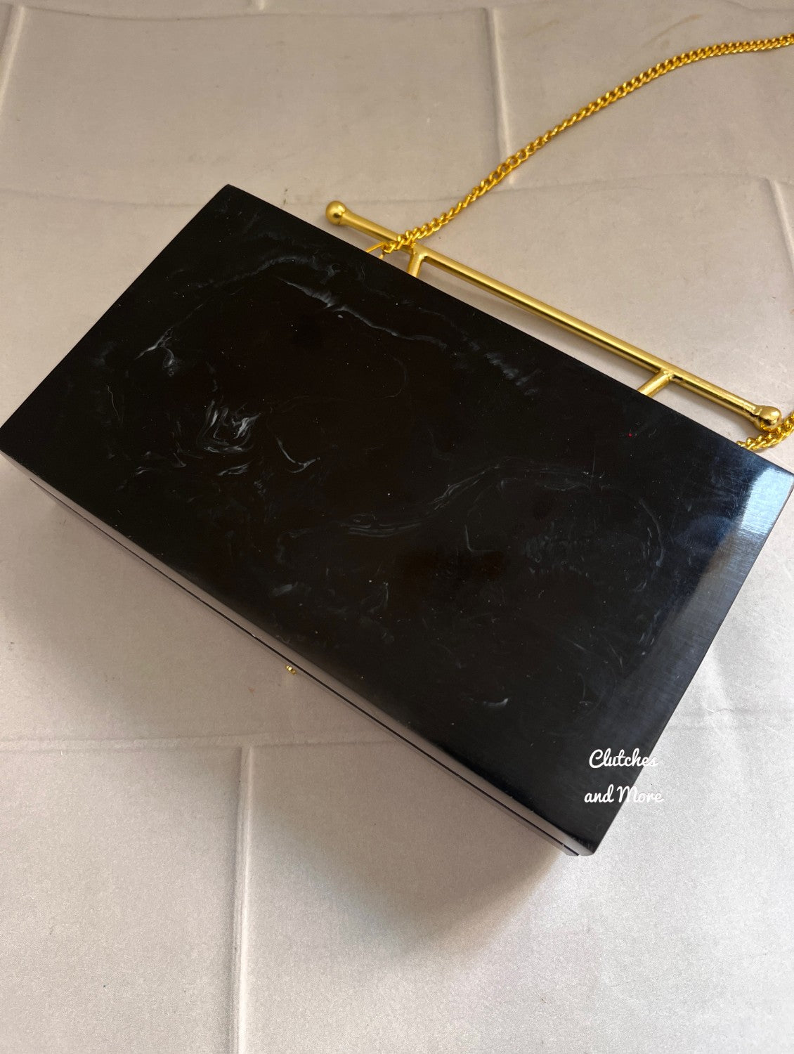 Black Handheld Premium Resin Clutch