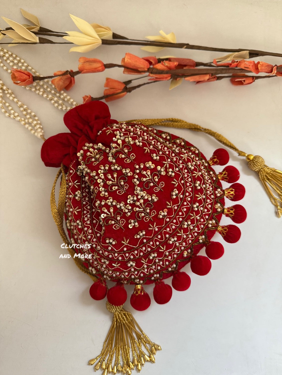 Red Ball Tassles Potli