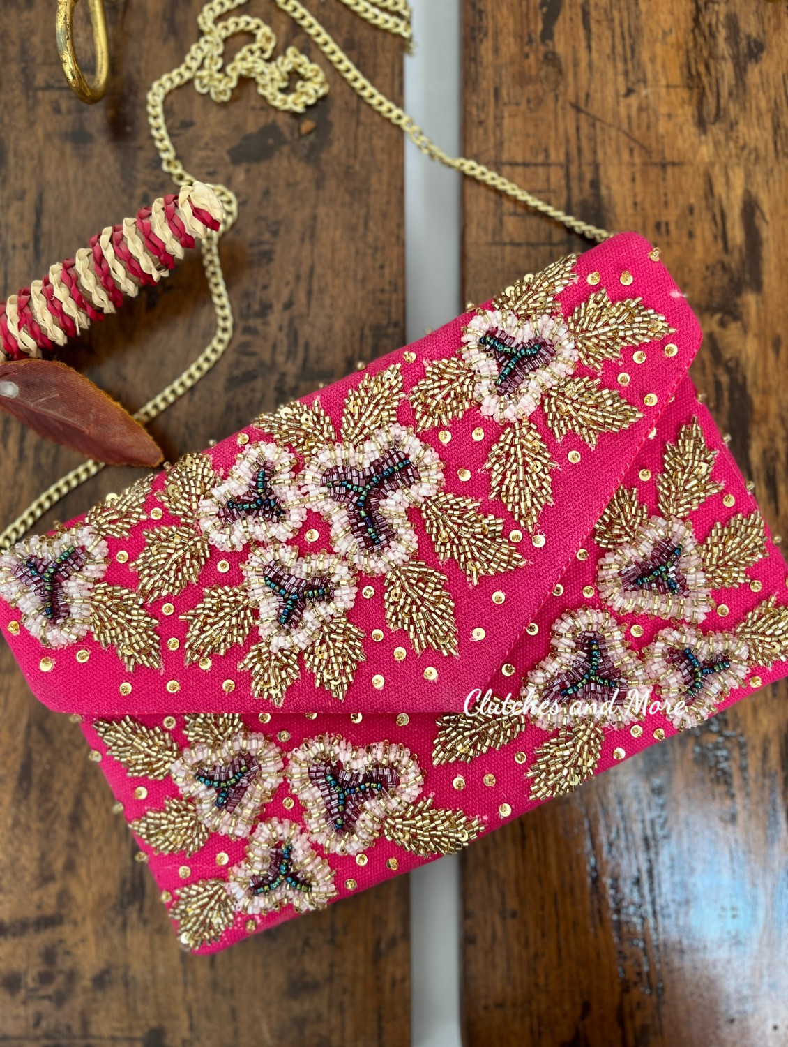 Red and 2025 pink clutch bag