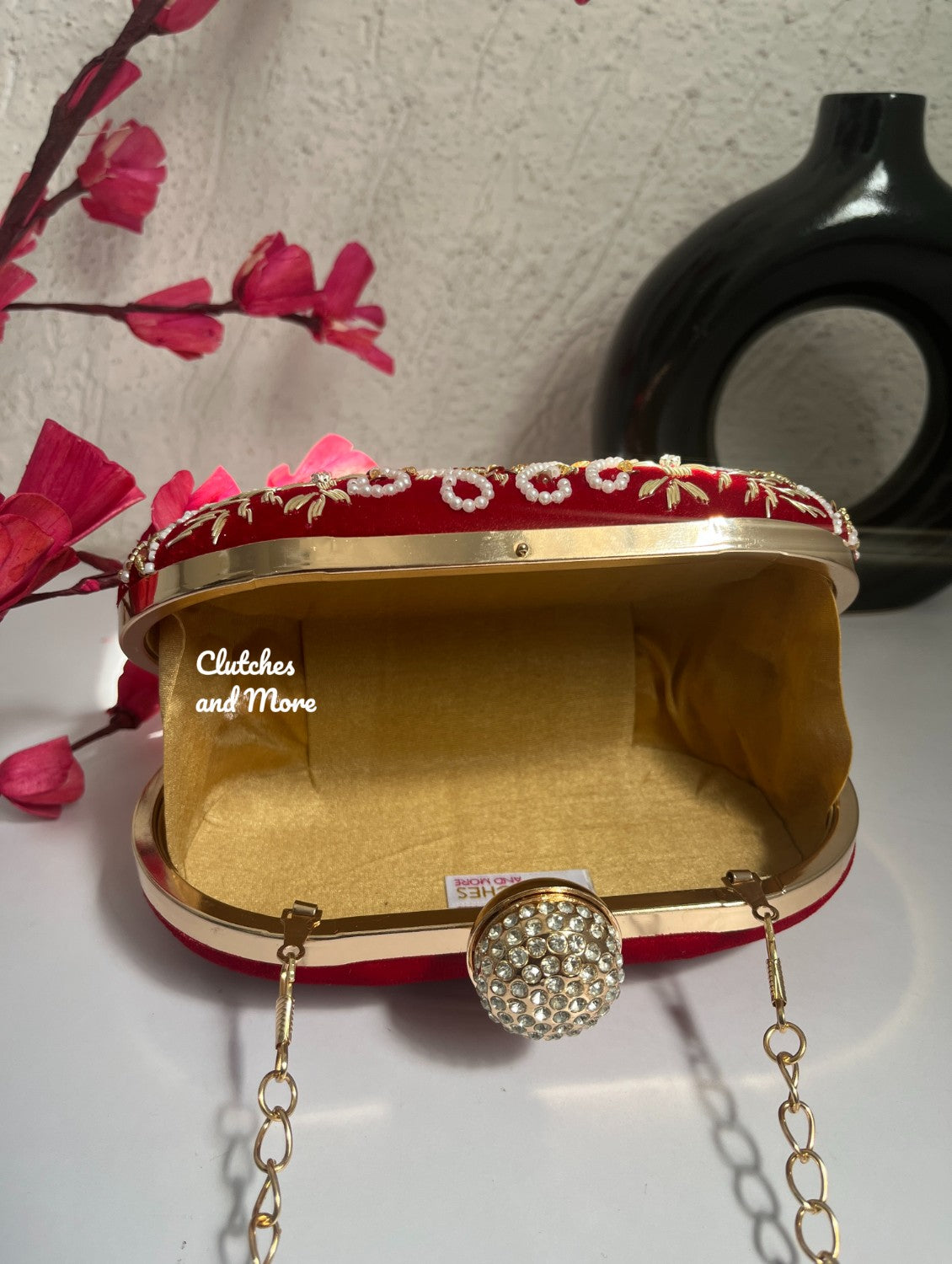 Aarohi Red Capsule clutch