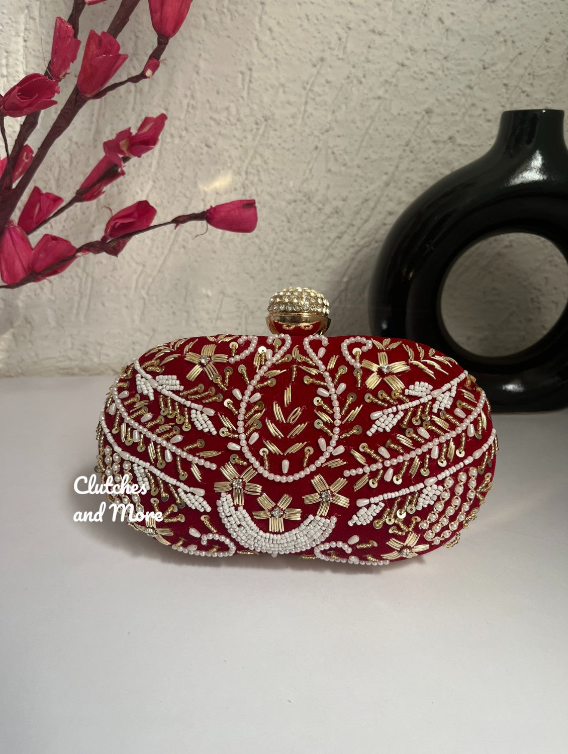 Aarohi Red Capsule clutch