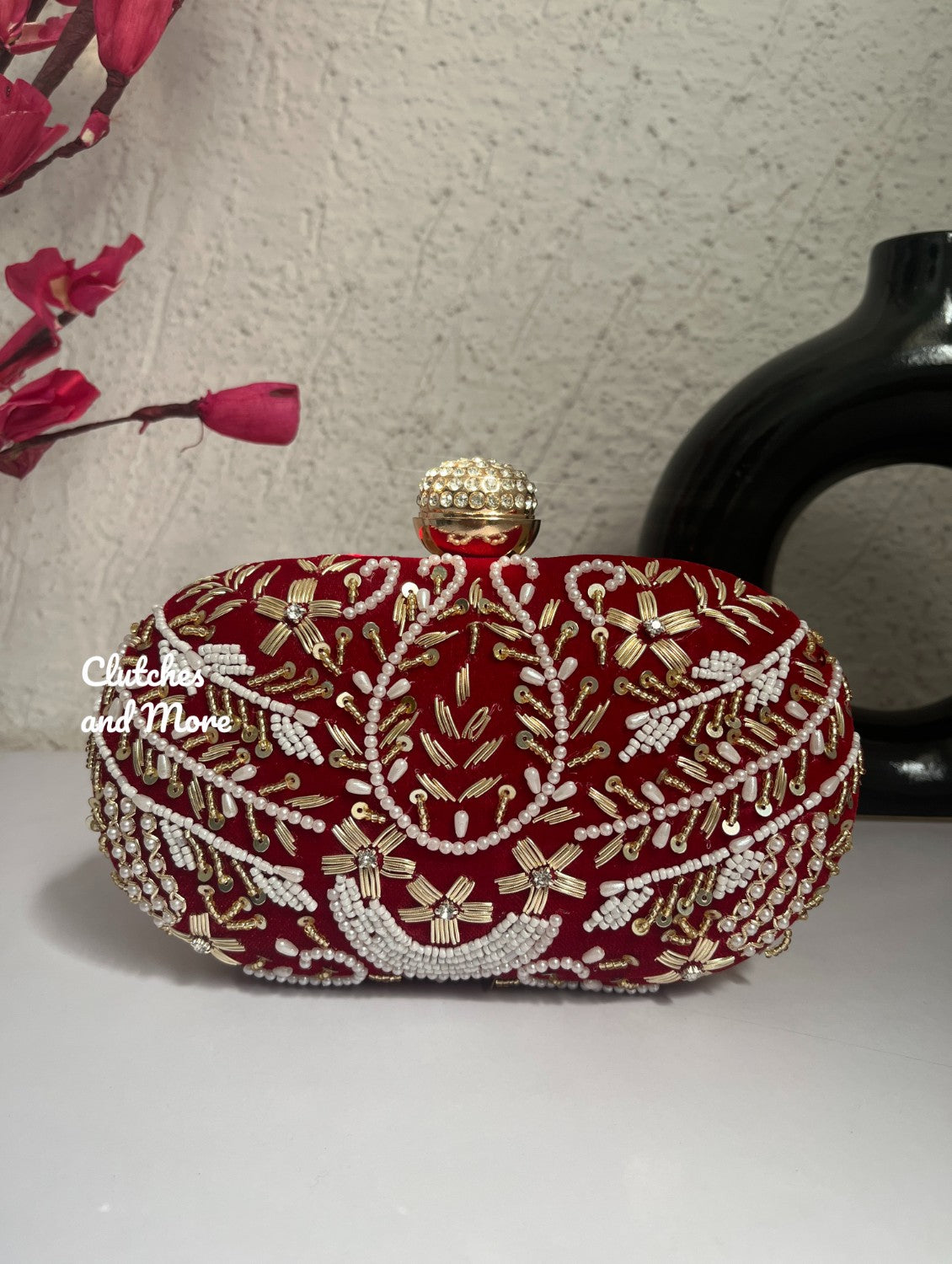 Aarohi Red Capsule clutch