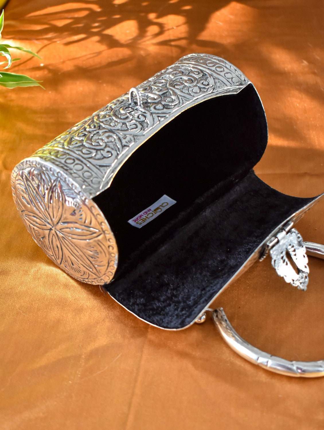 Cylindrical brass clutch silver