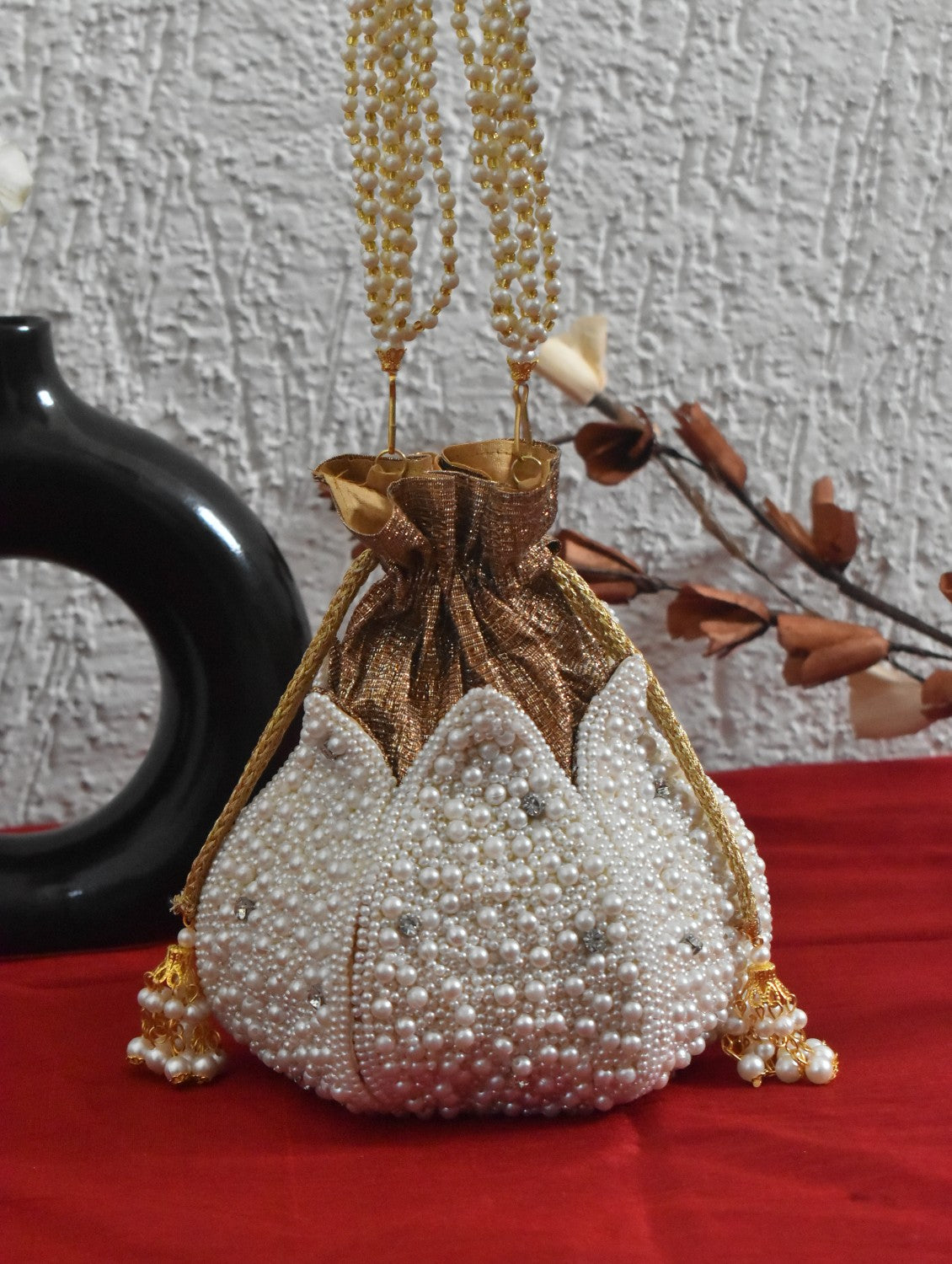 White pearl diamond studded lotus potli