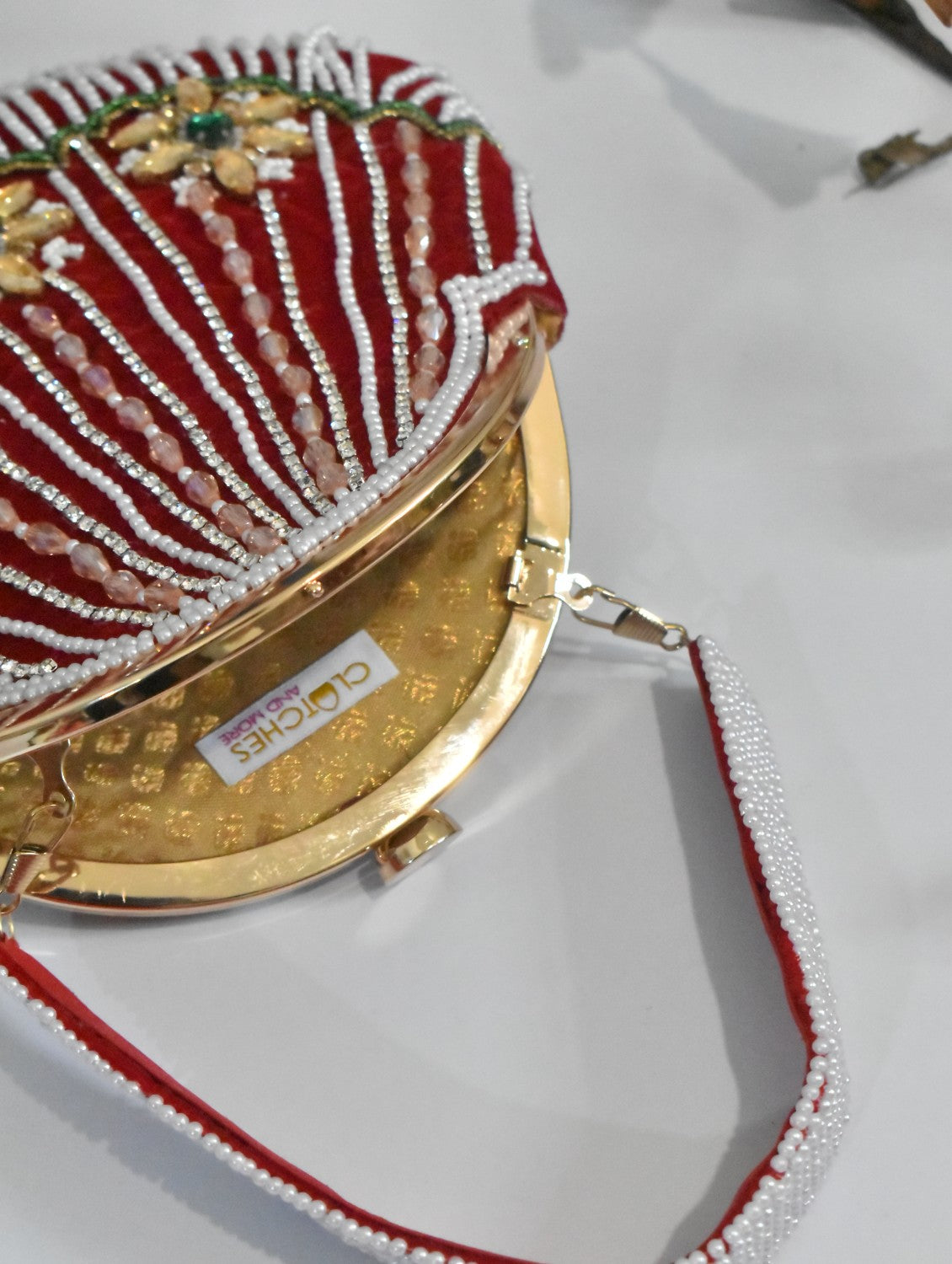 Rimjhim Red Stone Studded batua bag