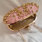 Pink and Gold Capsule clutch