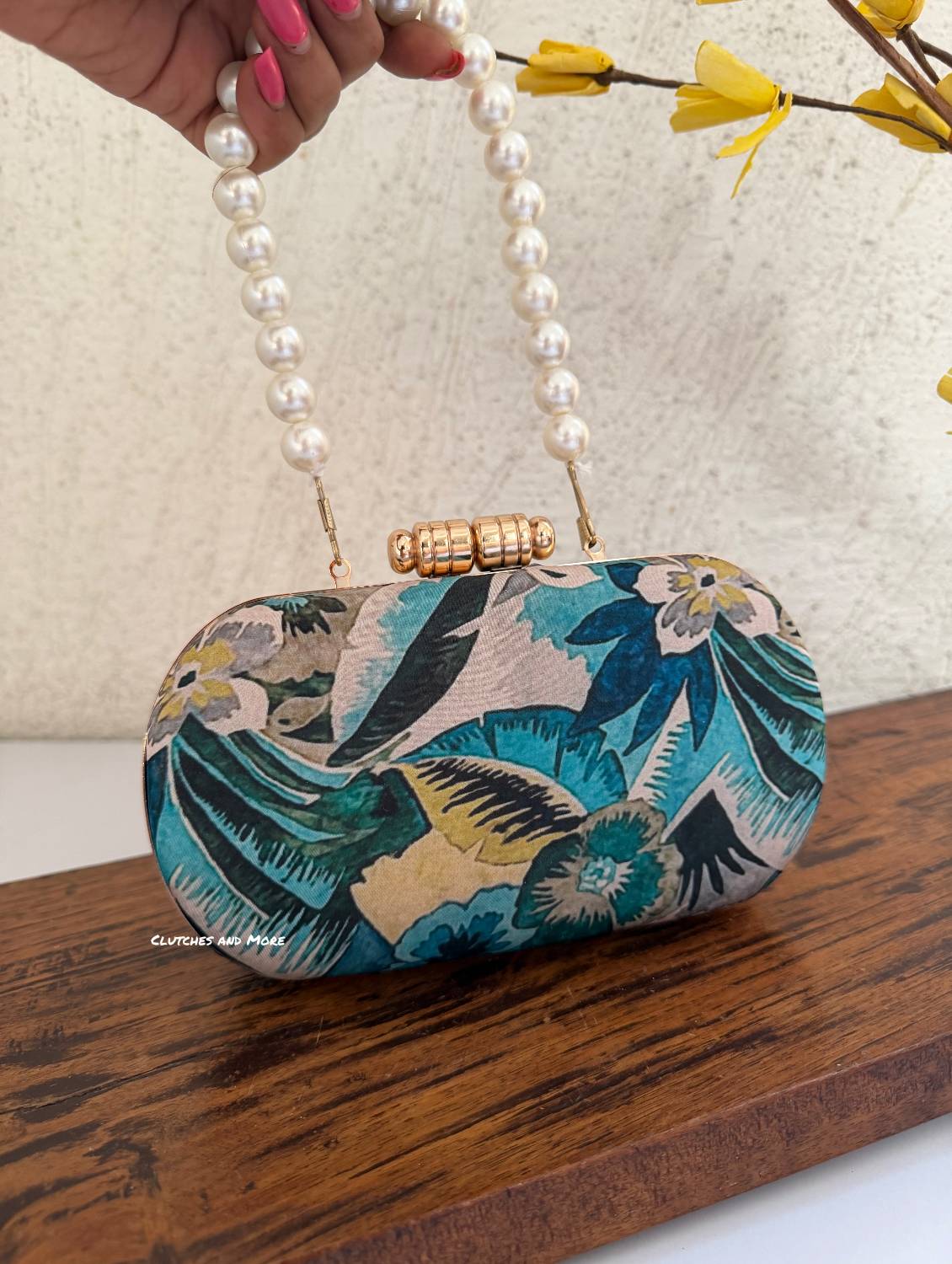 Paradise Blue Multicolored Floral Clutch