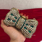 Kiana Kundan Bow Clutch Green Gold