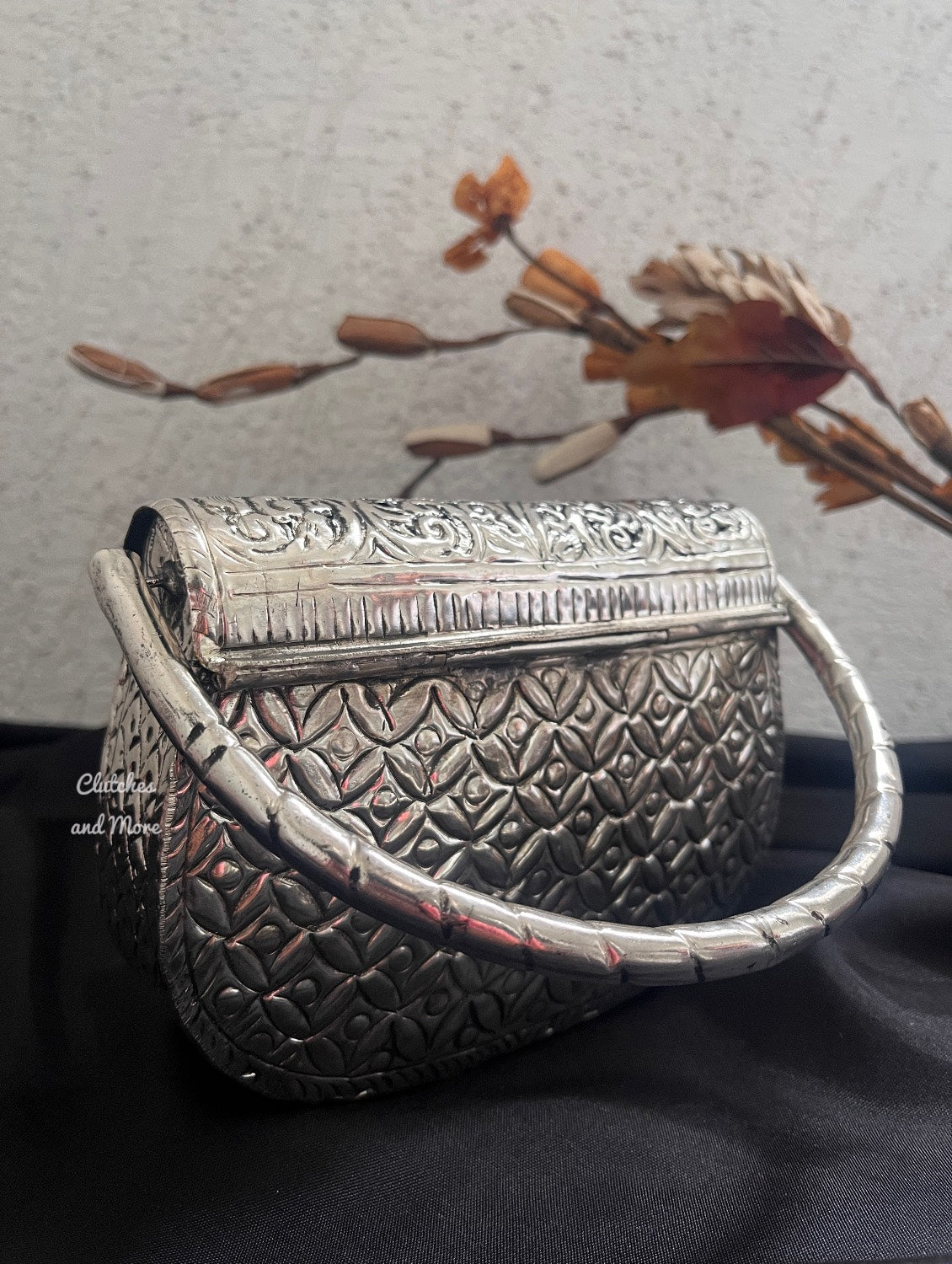 Silver Brass Clutch with designer handle