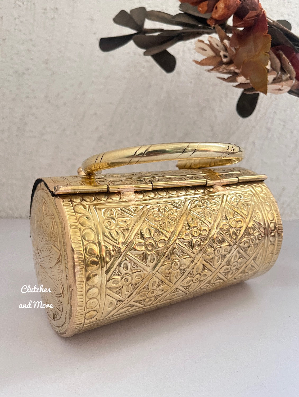 Cylindrical brass clutch Gold