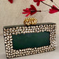 Kundan Green Resin clutch with Pearl Handle