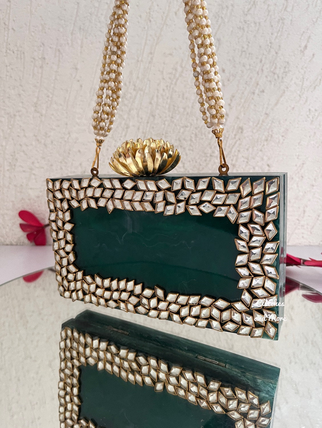 Kundan Green Resin clutch with Pearl Handle