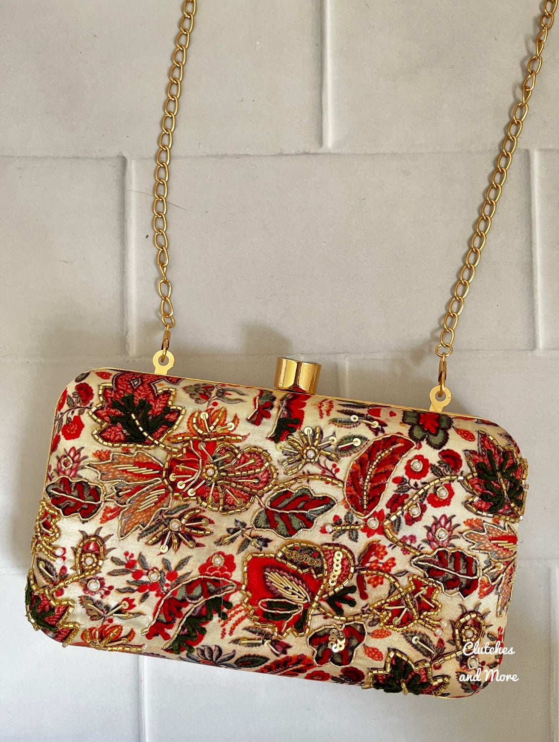 Handworked floral Clutch