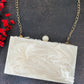 White resin clutch