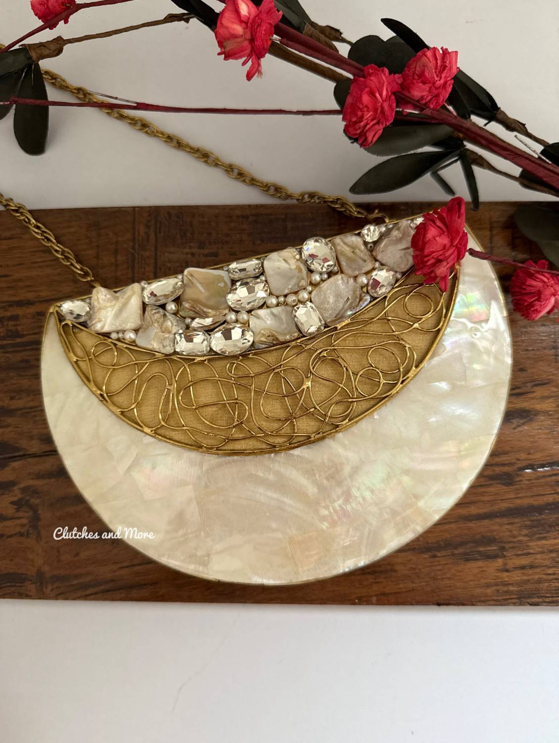 Half moon mother of pearl clutch