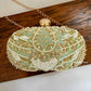 Aarohi Pastel Green Capsule Clutch