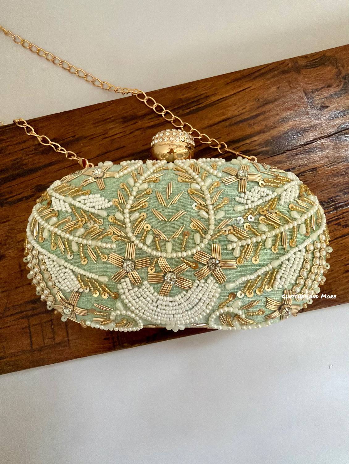 Aarohi Pastel Green Capsule Clutch