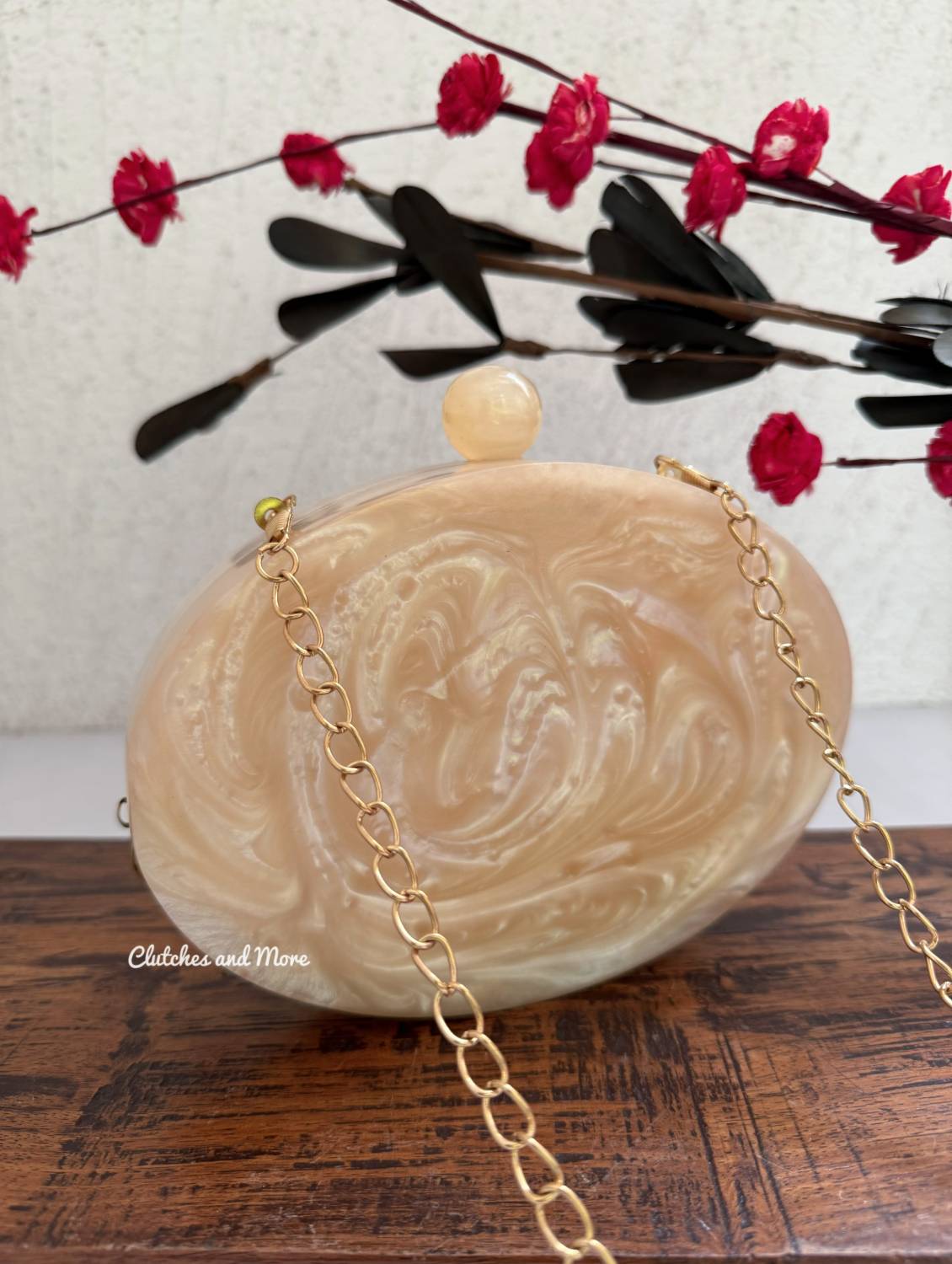 Embellished Oval Resin Clutch