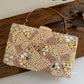 Elara Pearl and Shell Clutch Pink